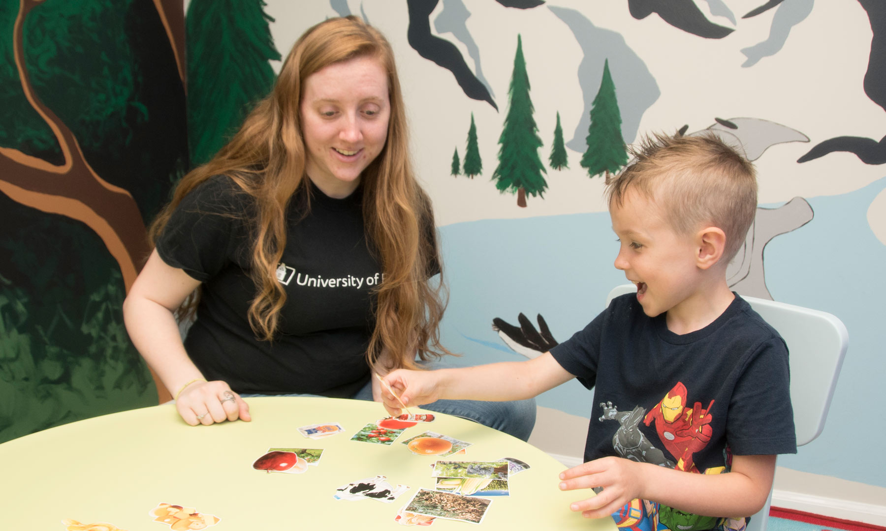 Findlay student plays game with elementary school aged child