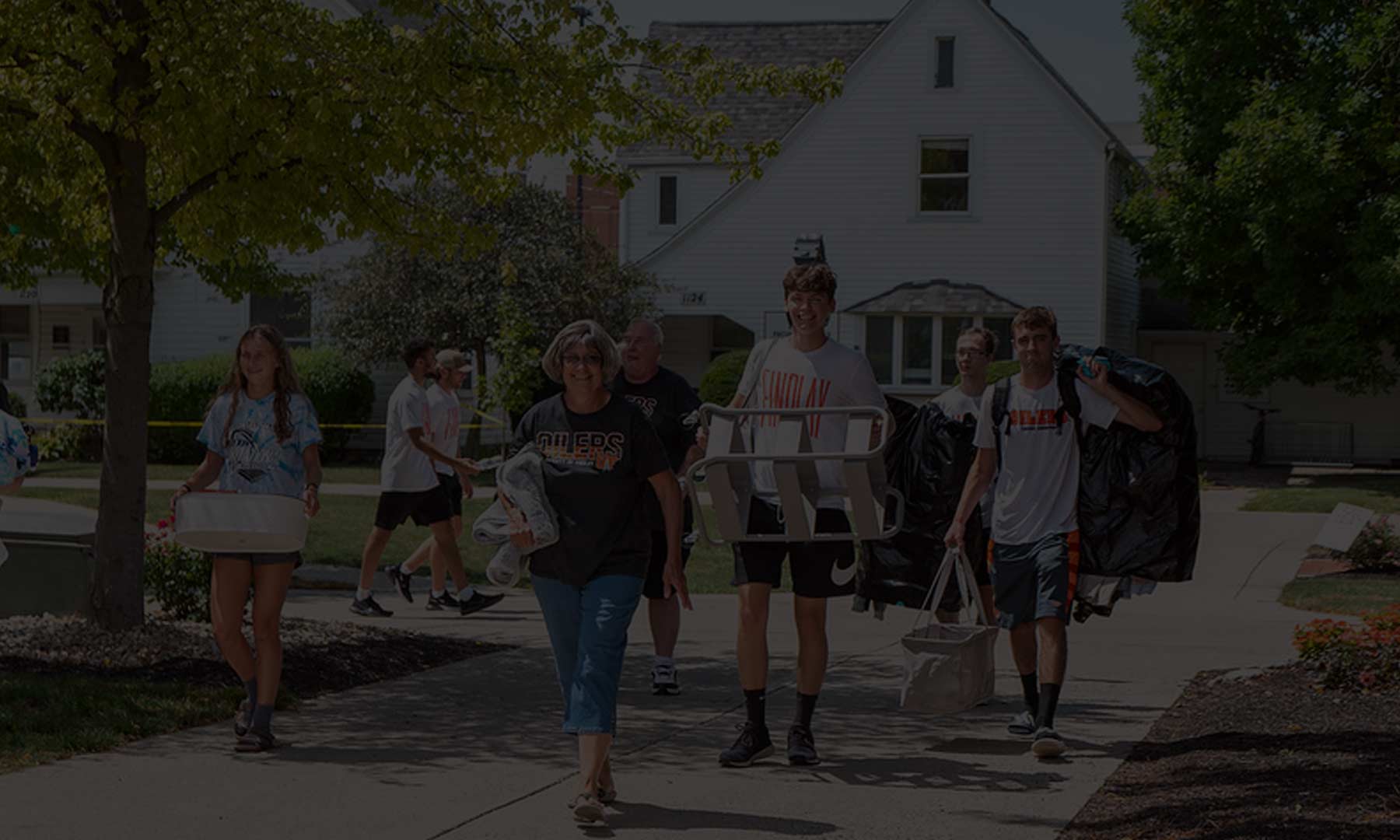 families moving items across campus during move in
