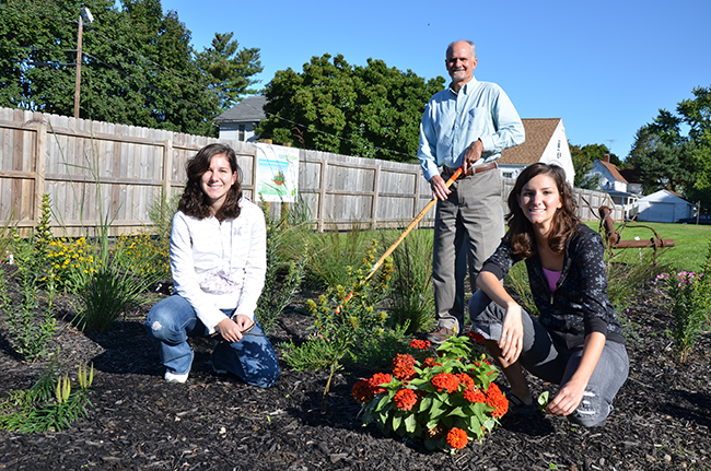 Faculty working in sensory garden