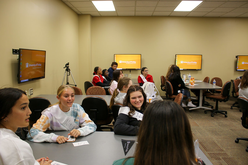 Students around tables