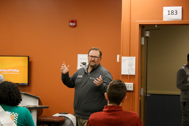 Professor talking to students