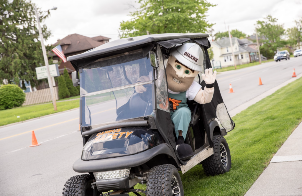 Derrick the Oiler on Golf Cart